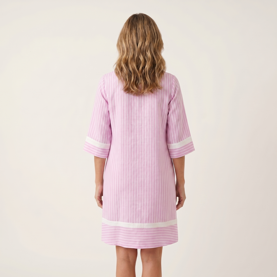 Pink striped cotton shift dress, back view, V-neck contrast trim and 3/4 sleeves