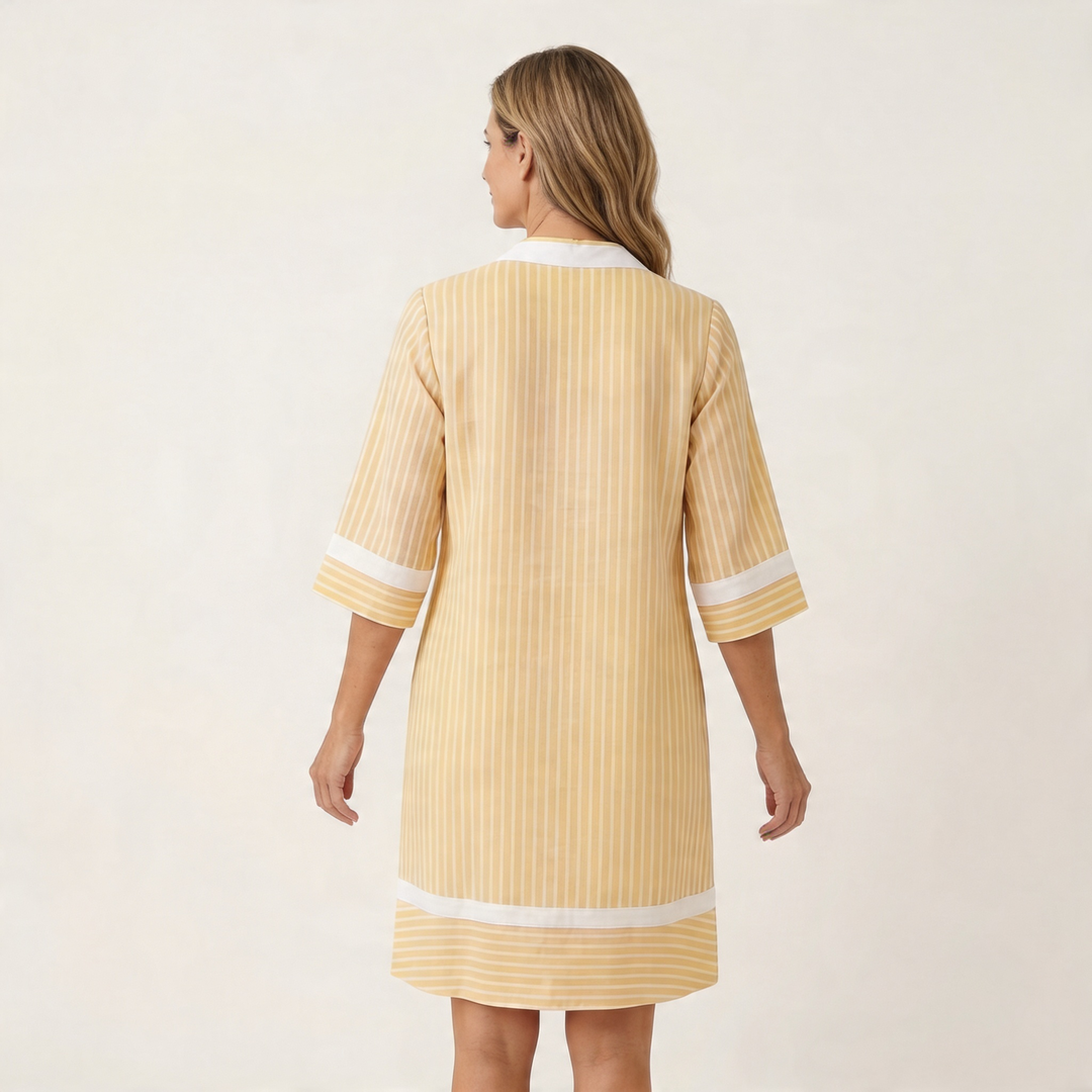 Yellow striped cotton shift dress, back view, V-neck contrast trim and 3/4 sleeves