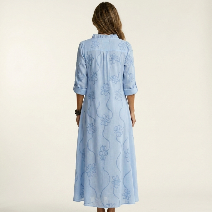Light blue cotton-linen maxi dress, tonal floral embroidery, back view with 3/4 sleeves