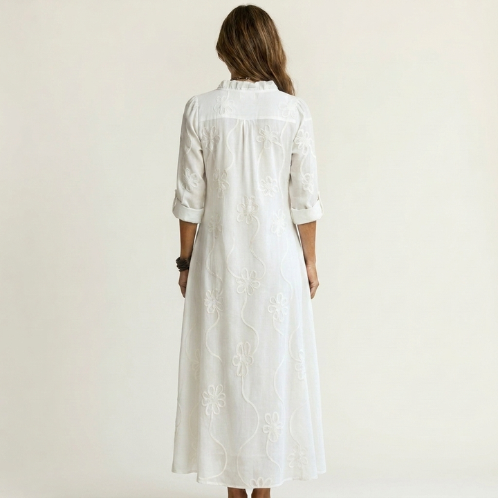 White cotton-linen maxi dress, tonal floral embroidery, back view with 3/4 sleeves