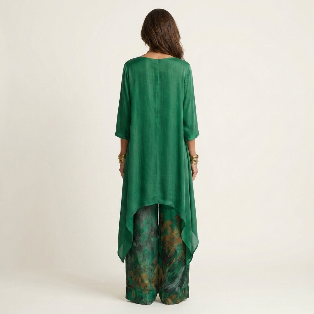 Green cotton-silk two-piece set, back view tunic with draped asymmetric hem and printed pants