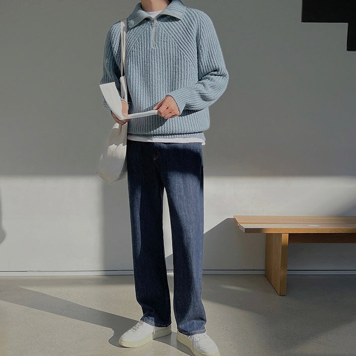 Light blue quarter-zip knit pullover sweater, front view with stand collar and zipper.