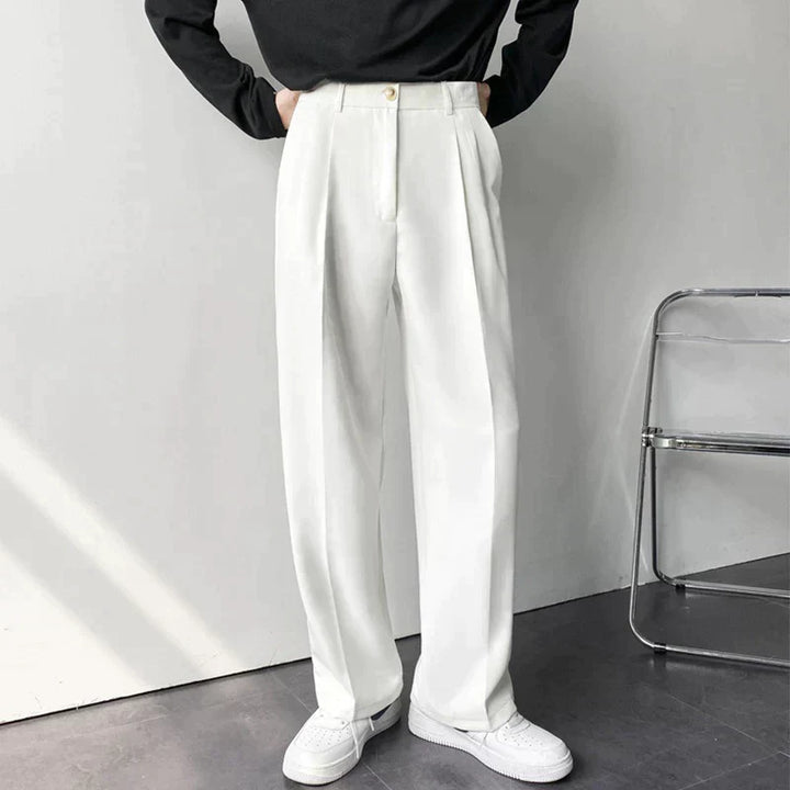White pleated wide-leg trousers with high waist and belt loops