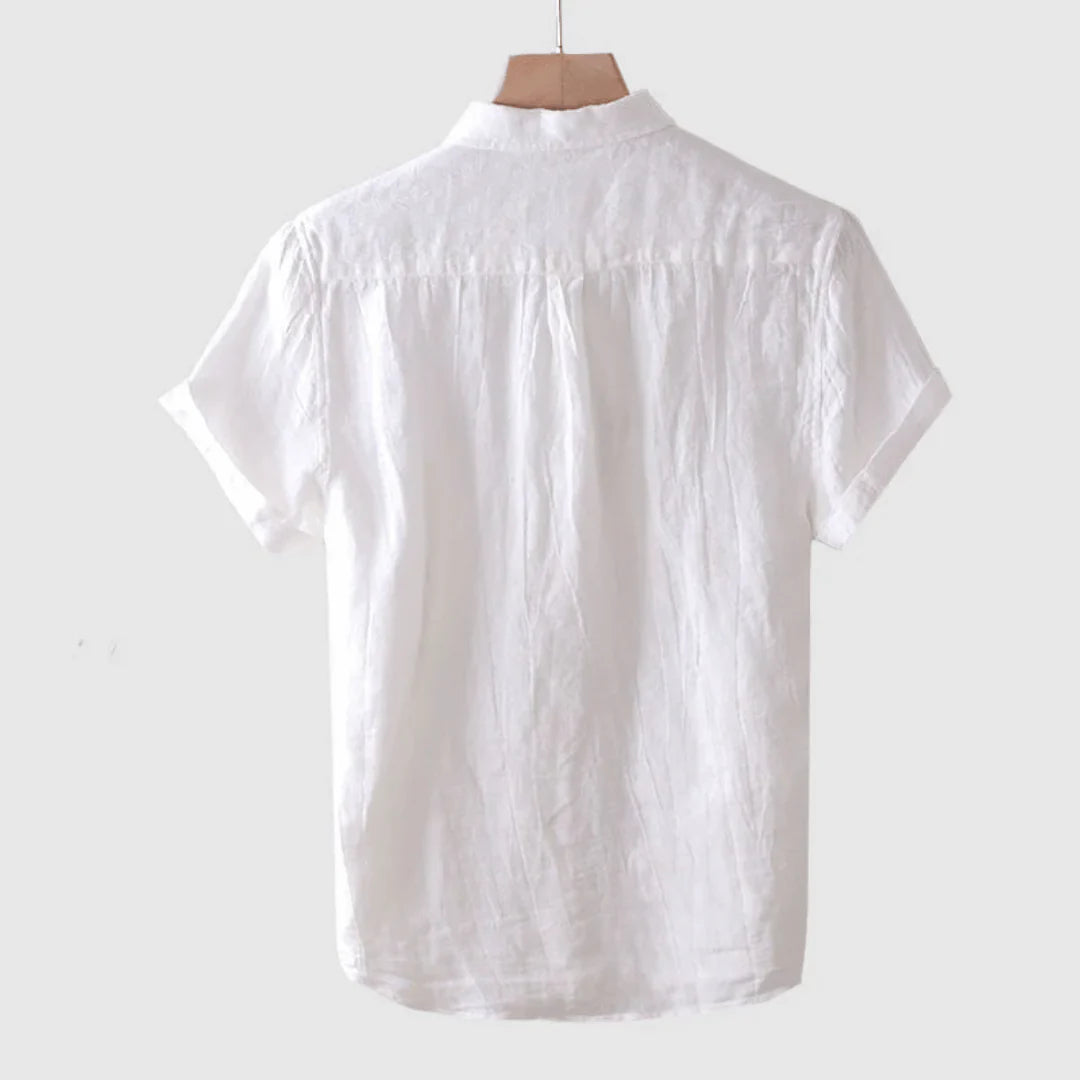 White short-sleeve button-up shirt, back view with relaxed shoulder and yoke pleat