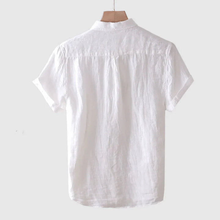 White short-sleeve button-up shirt, back view with relaxed shoulder and yoke pleat