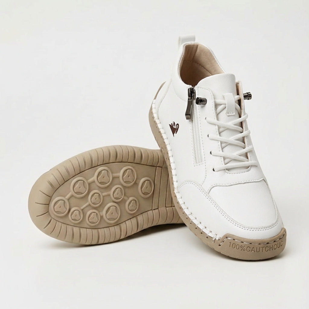 White side-zip lace-up sneakers with perforated stitching and tan textured sole