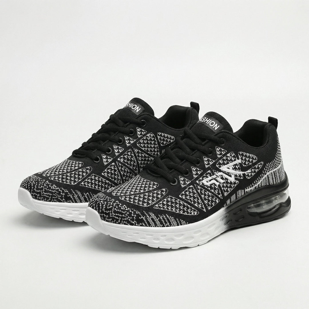 Black-and-white patterned women's walking sneakers with lace-up front and air-cushion sole