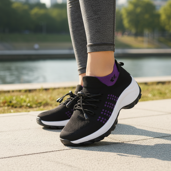 Black and purple lace-up walking sneakers with white cushioning sole