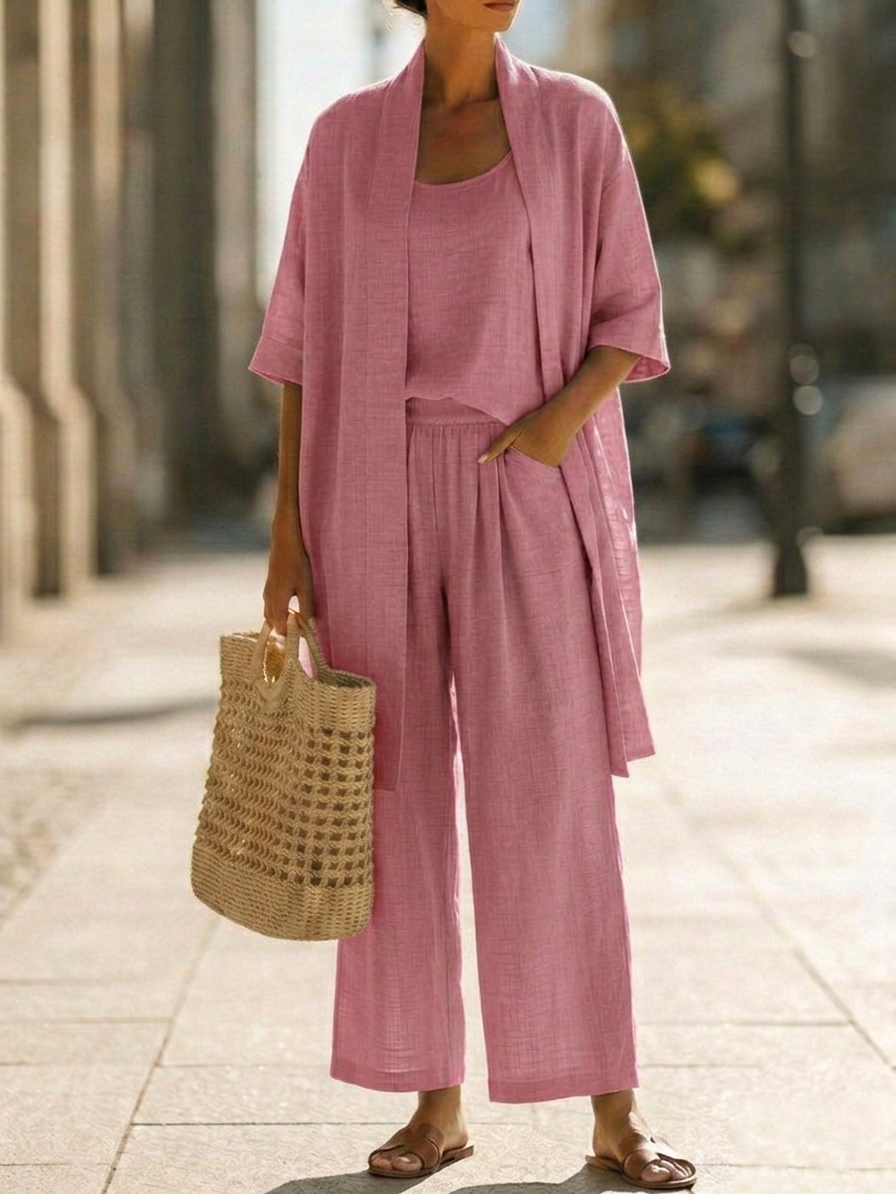 Women’s lounge set in dusty rose: short-sleeve cardigan over sleeveless top and wide pants.