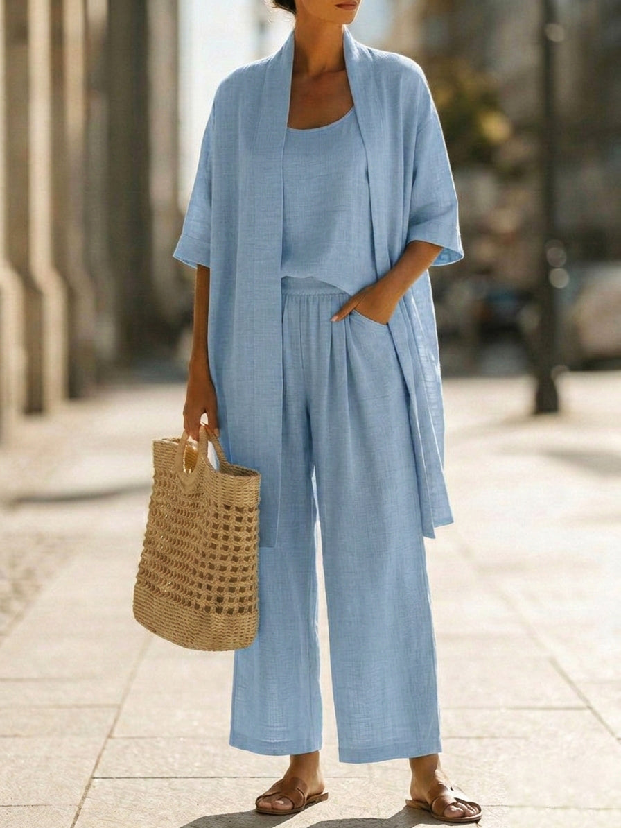 Blue lounge set with robe, tank top, and wide-leg pants