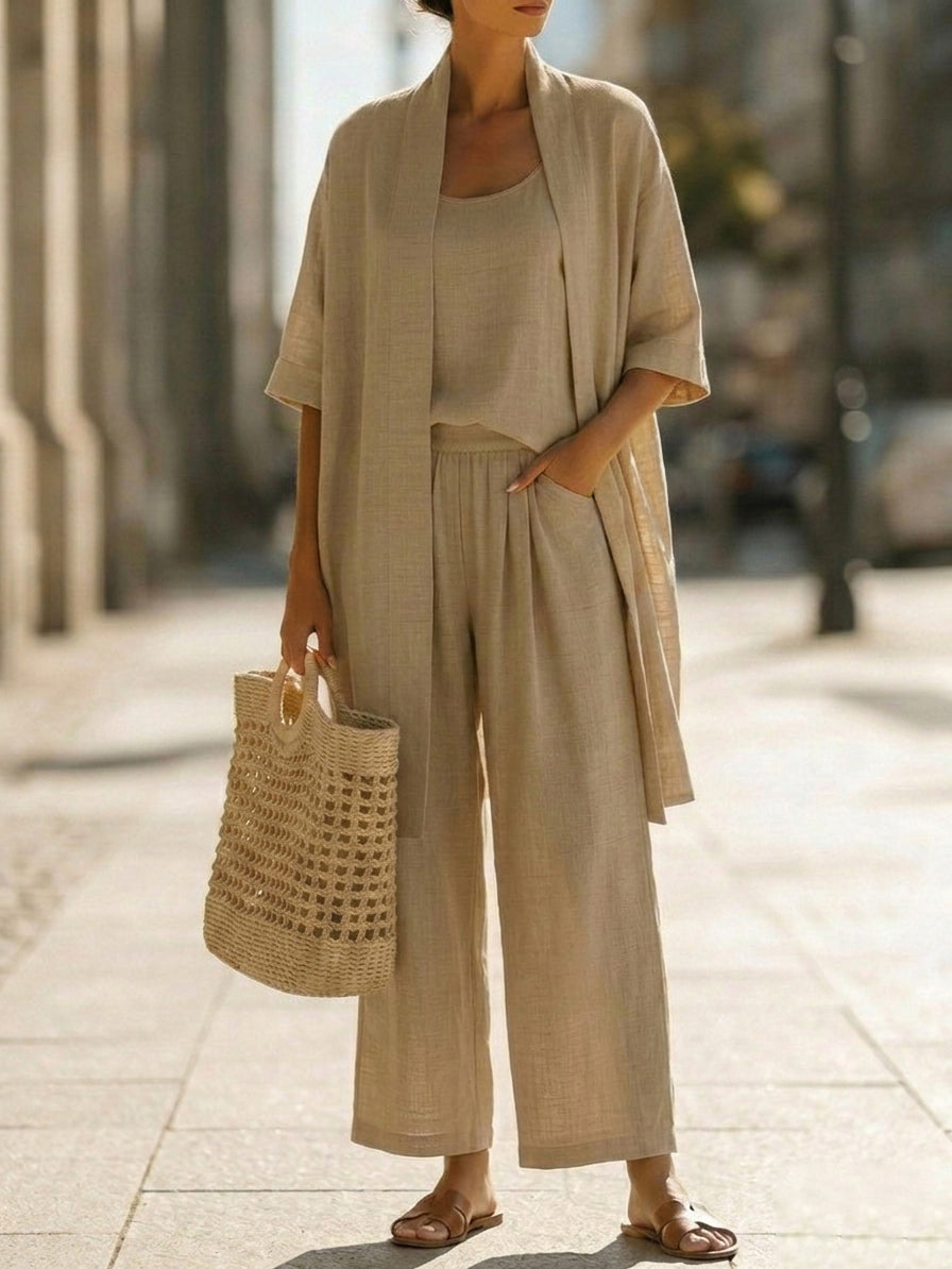 Beige 3-piece lounge set with short-sleeve top, wide-leg pants, and draped kimono cardigan