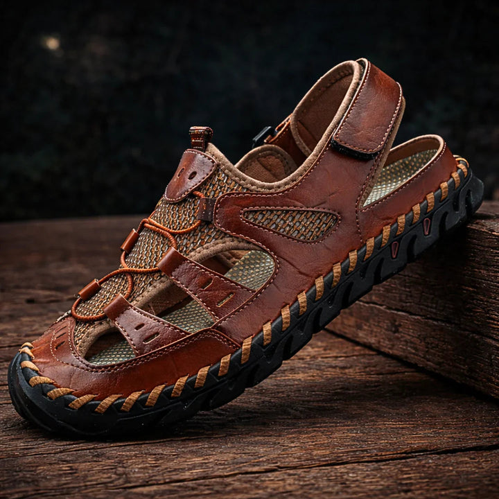 Rugged brown sandals with hook-and-loop straps, breathable panel cutouts